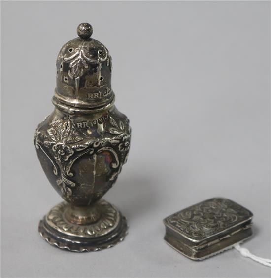 A George IV silver vinaigrette by Nathaniel Mills, Birmingham, 1826 and a later silver pepperette.
